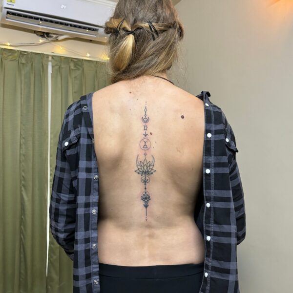 A Connection of Souls - Delicate Lotus & Trishula tattoo by Jordan at Natraj Tattoo Studio